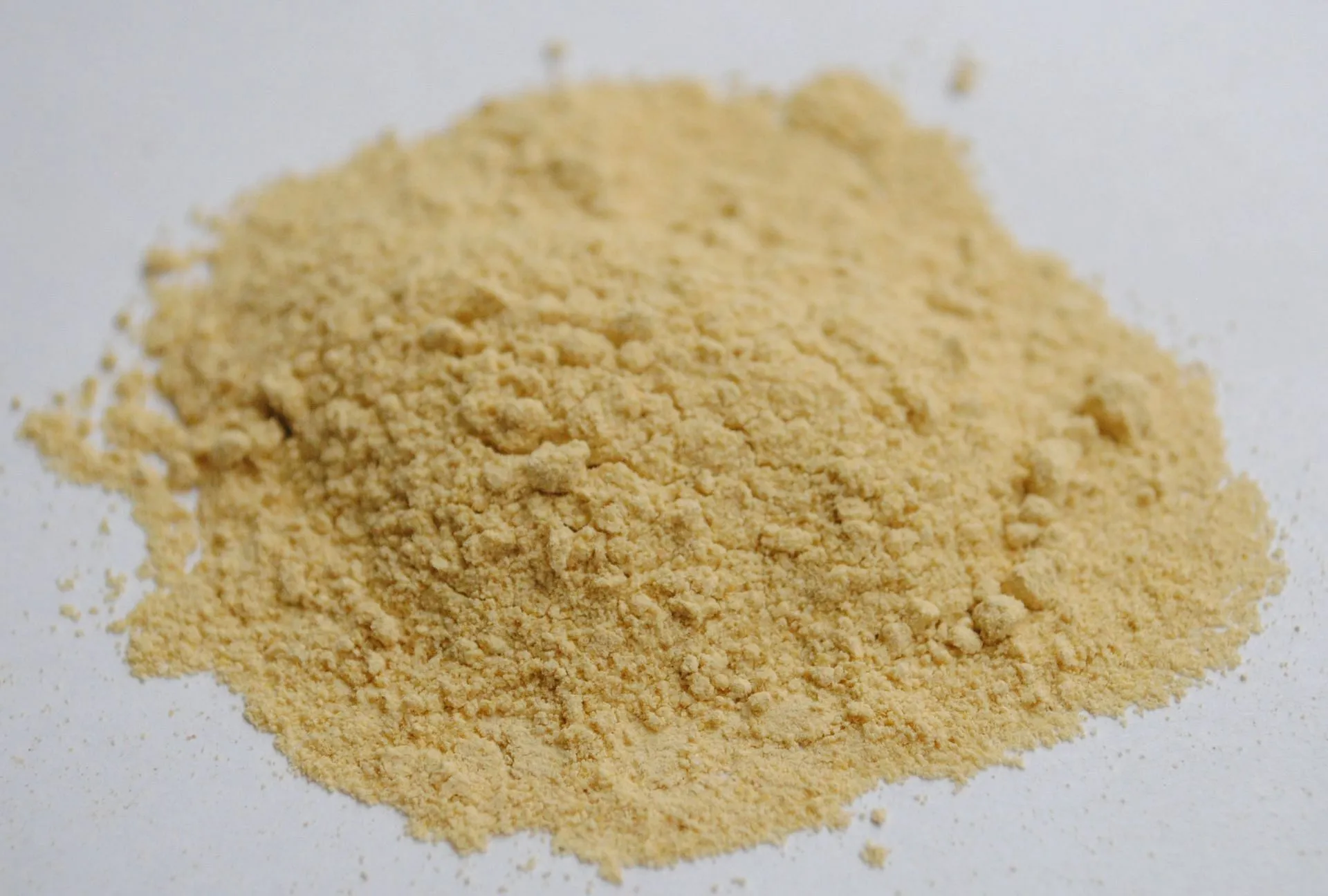 Ginger powder is made with dehydrated ginger (Image via Unsplash/ David Gabrielyan)