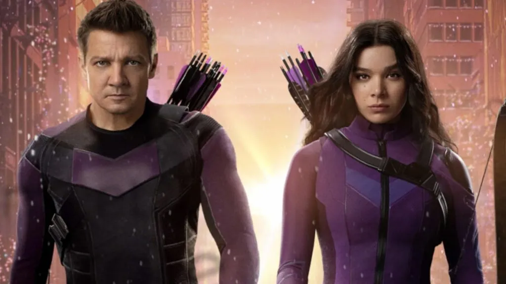 Hawkeye and Kate Bishop walk towards the camera a bright light behind them.