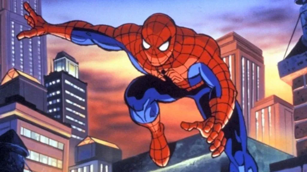 Spider-Man leaps from one rooftop to another.